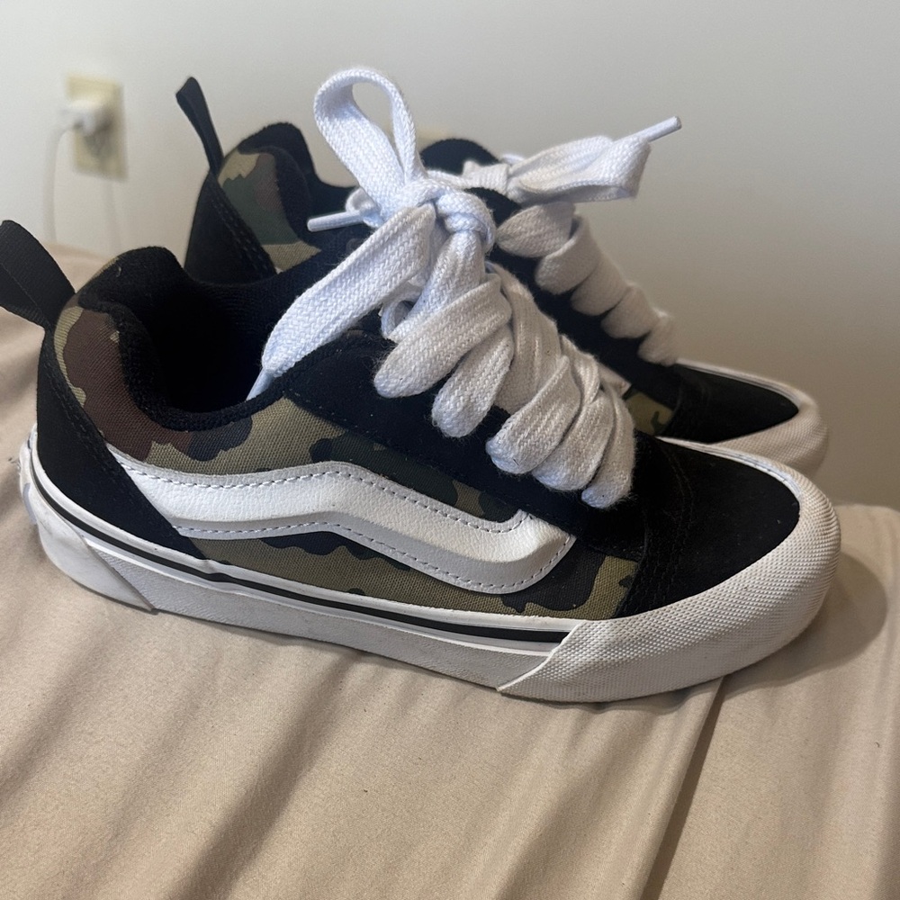 Vans Camouflage and Black Sneakers